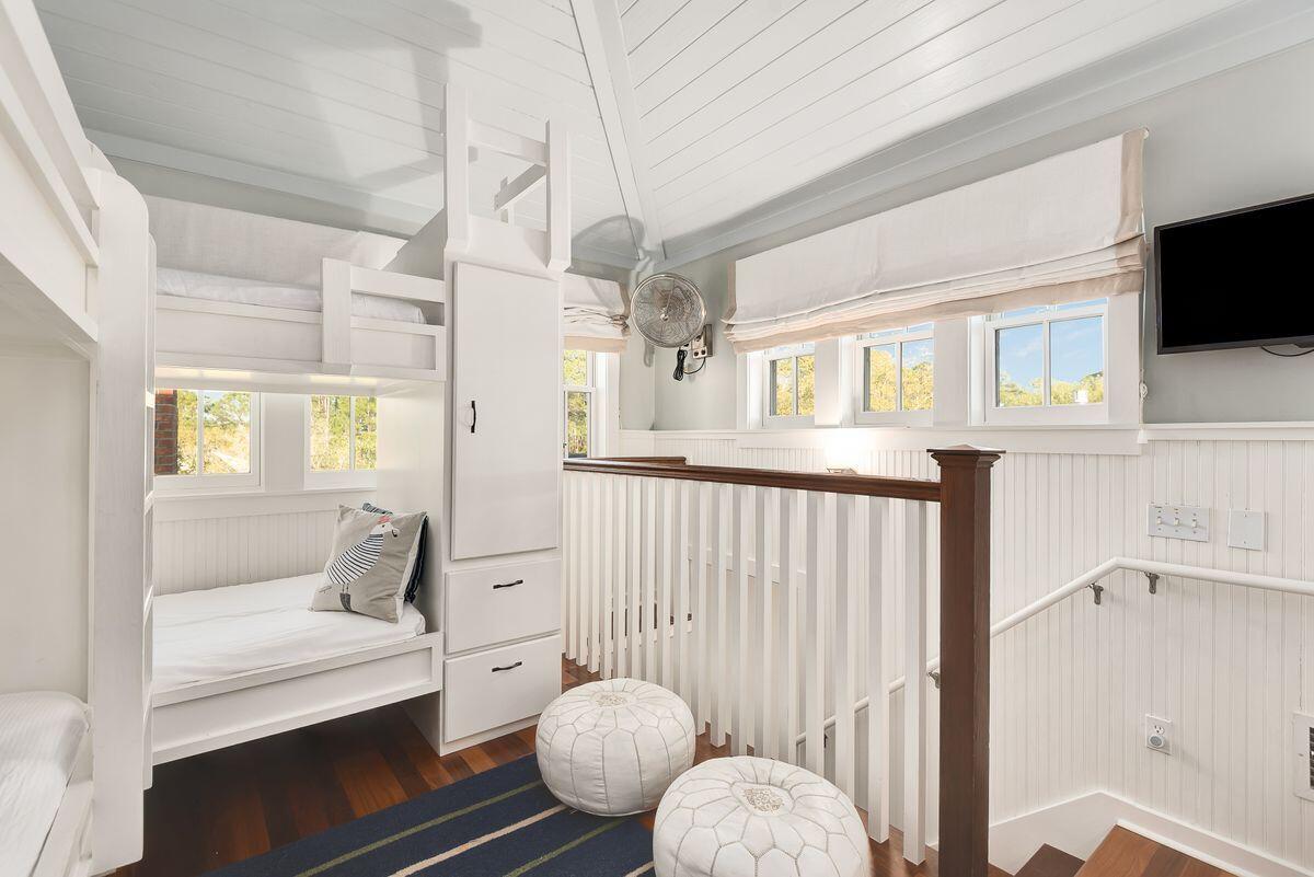 220 Salt Lane Watersound, FL 32461 - Photo 27 of 35 a living room with furniture and a flat screen tv