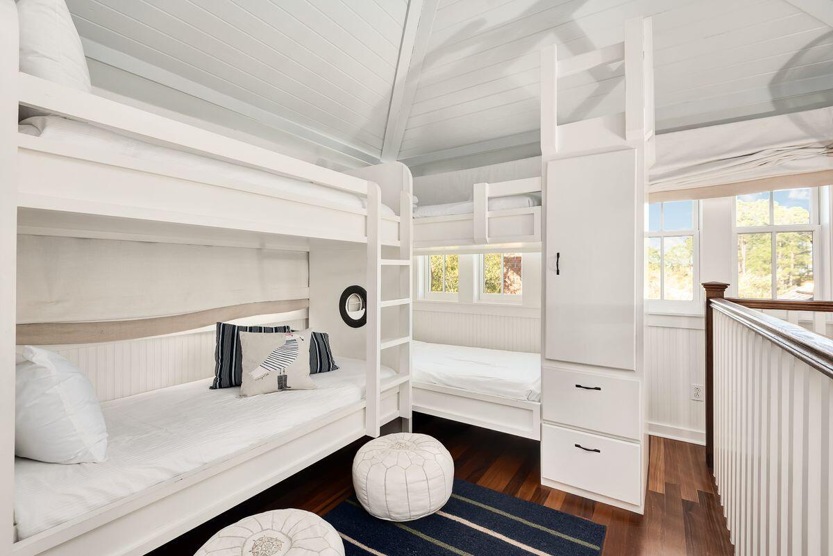 220 Salt Lane Watersound, FL 32461 - Photo 28 of 35 a living room with furniture and a table