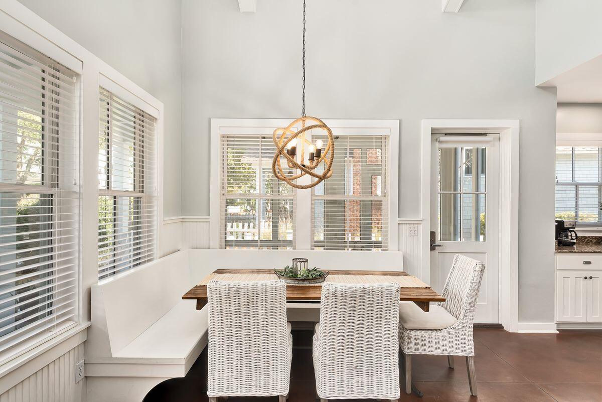 220 Salt Lane Watersound, FL 32461 - Photo 4 of 35 a dining room with furniture and windows