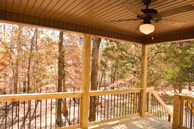 22 Salem Ridge Road Clarksville, TN 37040 - Photo 5 of 20 COVERED BACK DECK OVERLOOKING YOUR 1.5 ACRE WOODED PROPERTY! NO NEIGHBORS IN BACK!