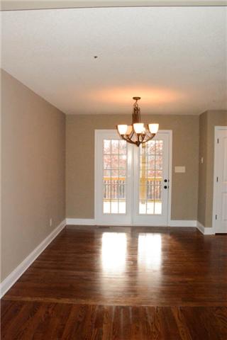 22 Salem Ridge Road Clarksville, TN 37040 - Photo 8 of 20 DINING AREA WITH ACCESS TO COVERED BACK DECK. GORGEOUS LIGHTING FIXTURES!