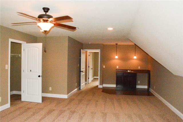 22 Salem Ridge Road Clarksville, TN 37040 - Photo 9 of 20 BONUS ROOM! SPACE FOR ALL KINDS OF ACTIVITIES OR TURN INTO A SEPARATE LIVING AREA. CUSTOM WET BAR & OVERSIZED WALK IN CLOSET!