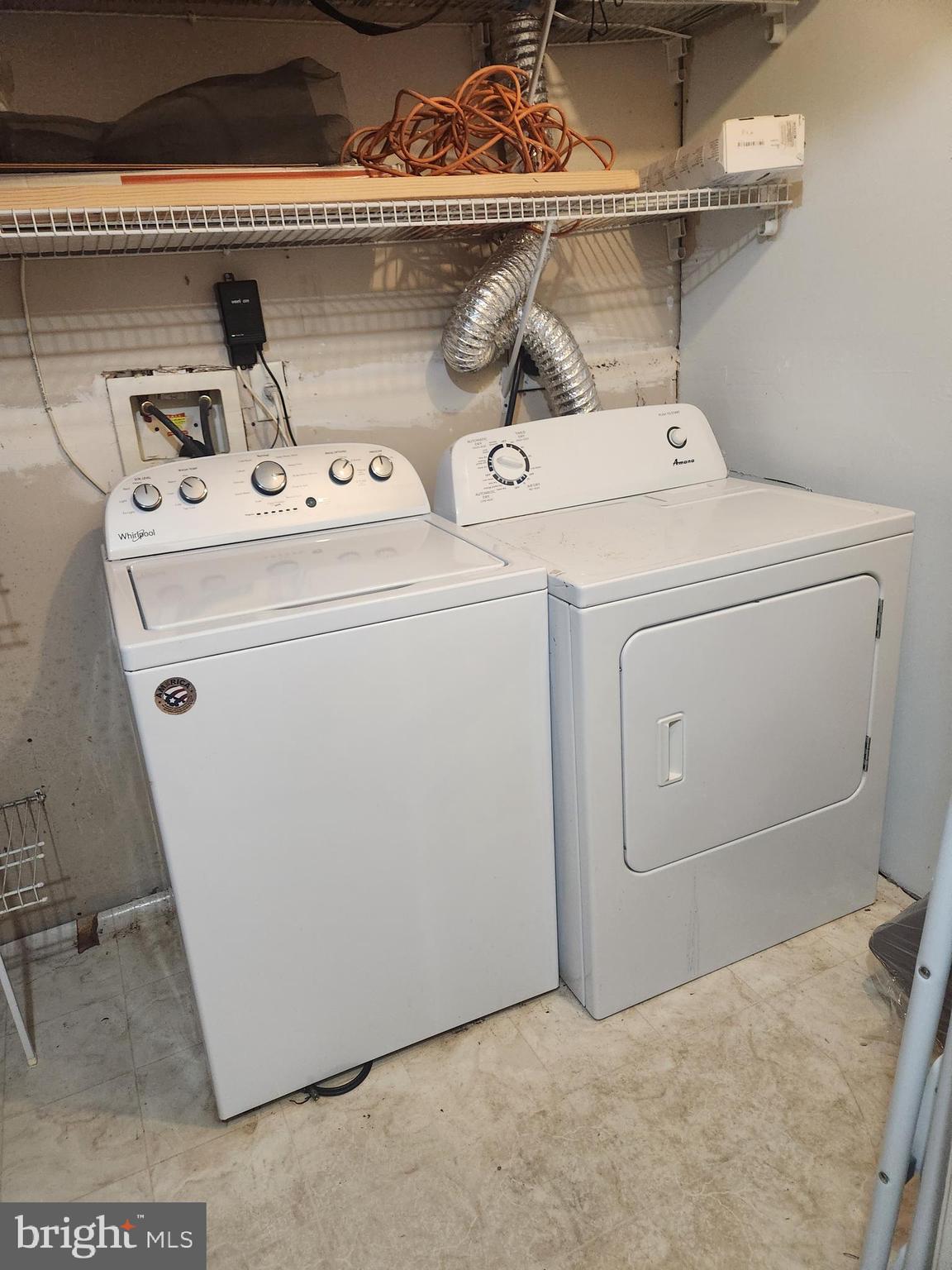 12912 Boggy Trail Way, Unit 55 Germantown, MD 20876 - Photo 27 of 27 a utility room with dryer and washer