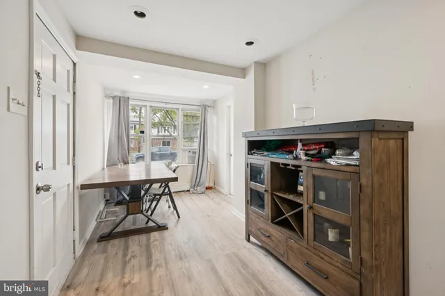 a view of a livingroom with furniture and wooden floor