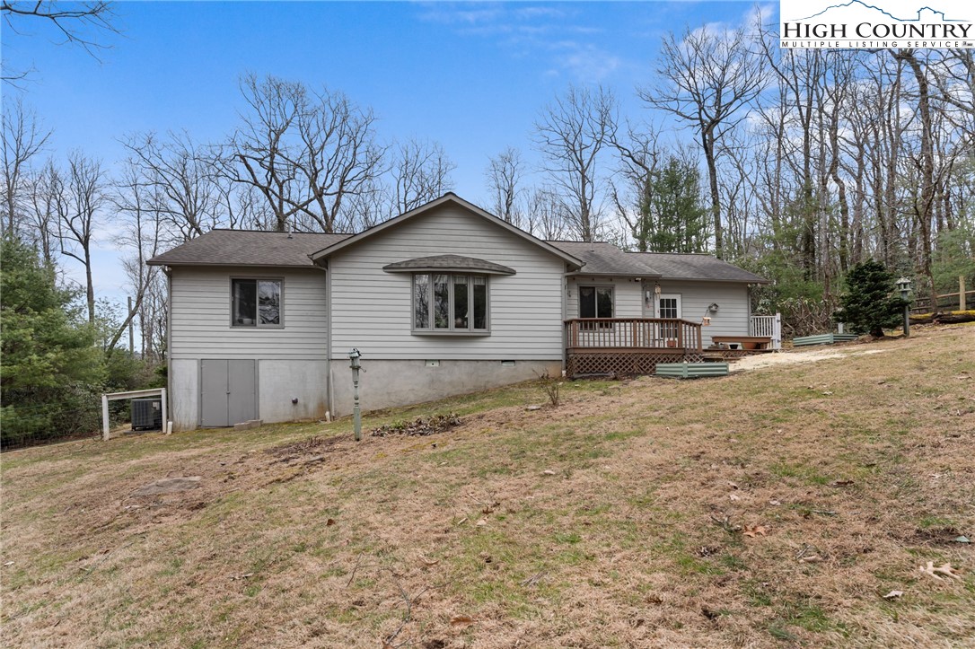 120 Village Road Glade Valley, NC 28627 - Photo 5 of 30 a front view of a house with a yard