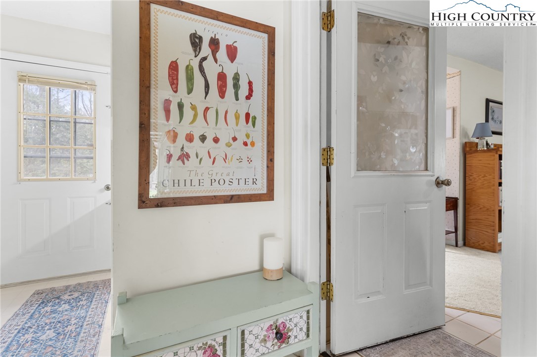 120 Village Road Glade Valley, NC 28627 - Photo 7 of 30 a bathroom with a walk in closet
