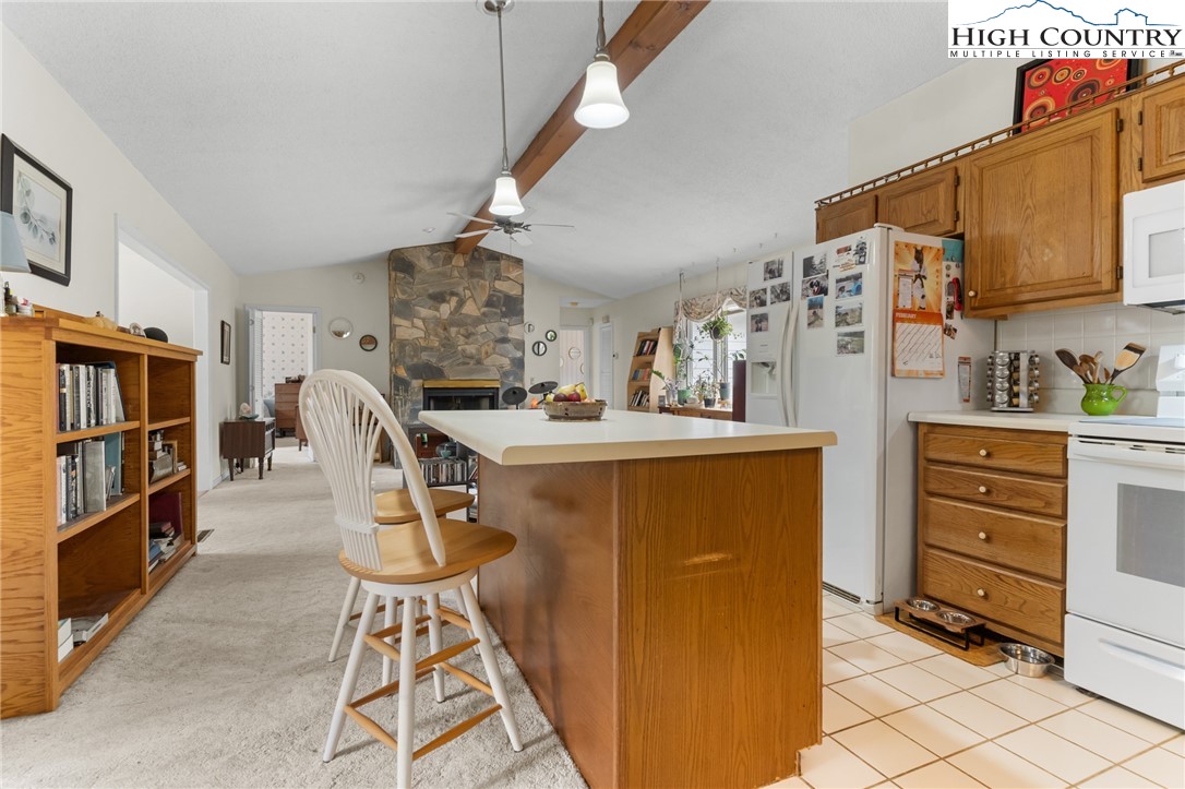 120 Village Road Glade Valley, NC 28627 - Photo 8 of 30 a view of kitchen and cabinets