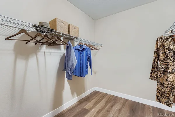 a bedroom with a bed and a cabinets