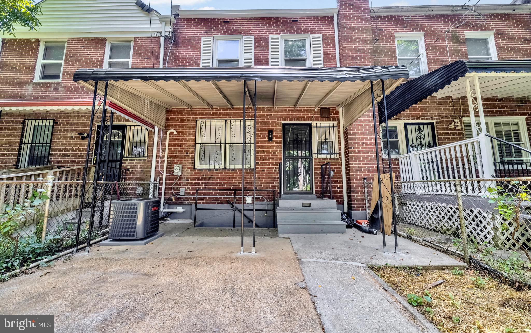 840 Benninghaus Road Baltimore, MD 21212 - Photo 26 of 30 a view of a patio with table and chairs