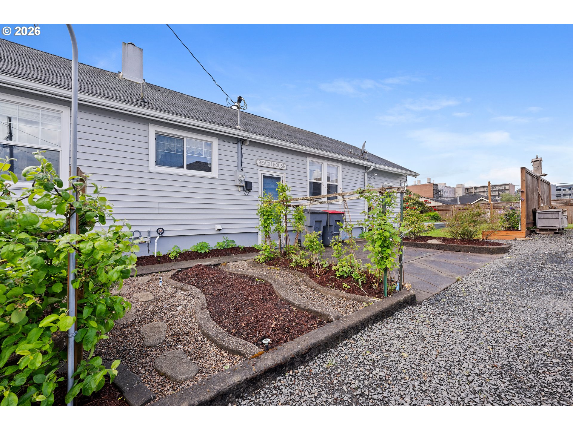 416 South Downing Street Seaside, OR 97138 - Photo 12 of 48 a view of a backyard with plants