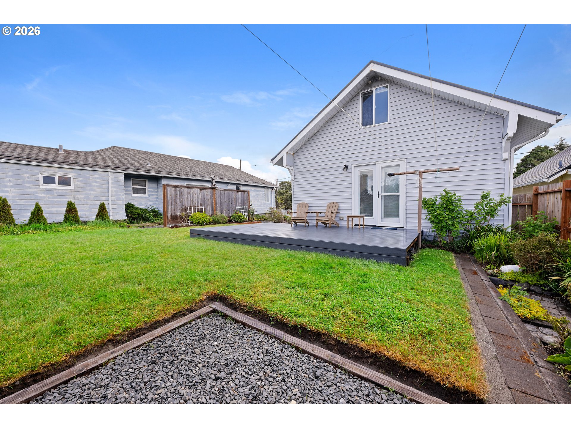 416 South Downing Street Seaside, OR 97138 - Photo 16 of 48 a front view of house with yard and green space
