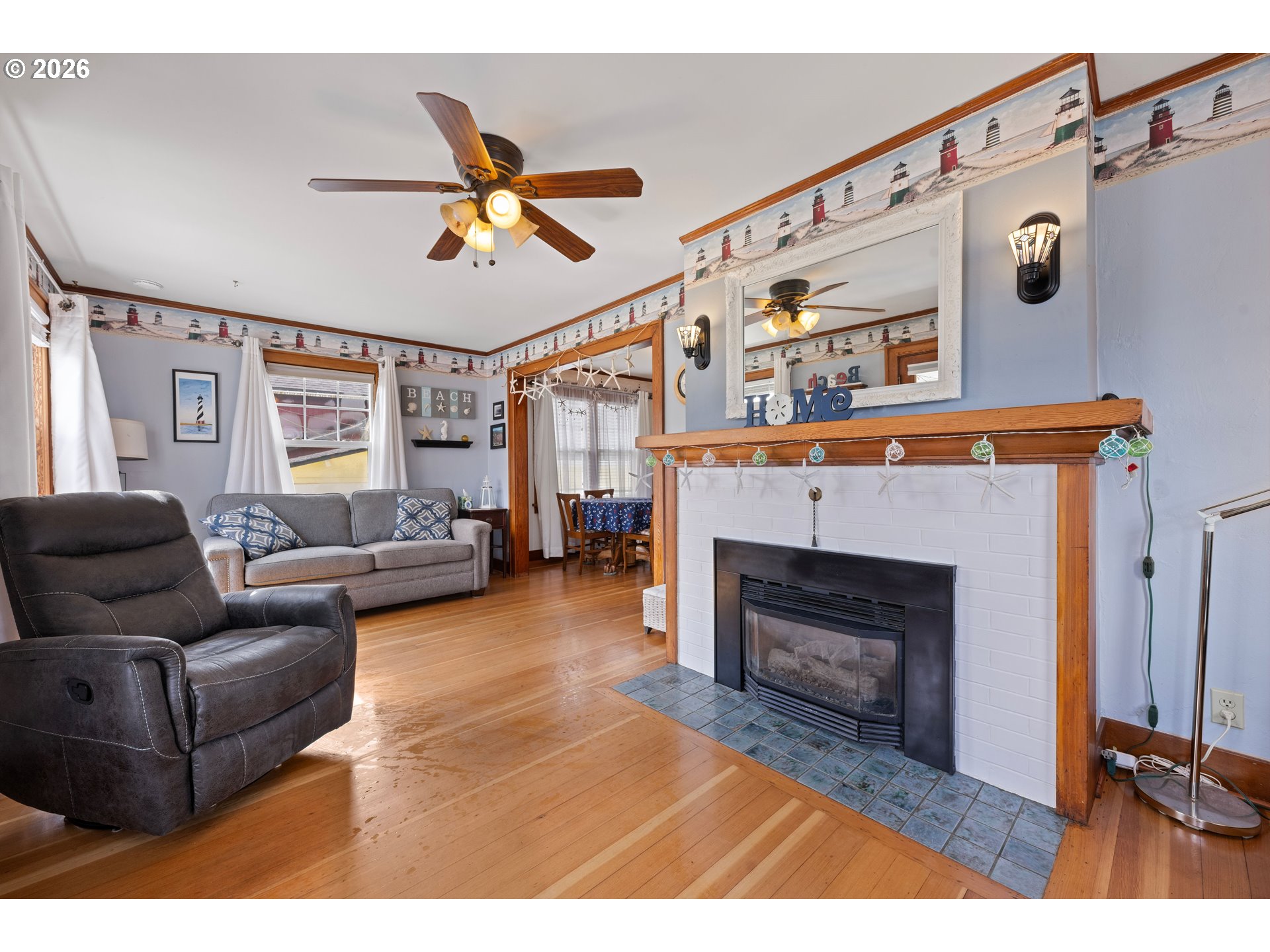 416 South Downing Street Seaside, OR 97138 - Photo 22 of 48 a living room with furniture and a fireplace