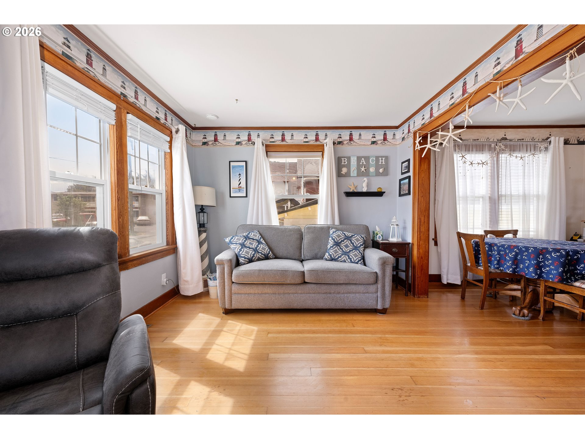 416 South Downing Street Seaside, OR 97138 - Photo 23 of 48 a living room with furniture and a large window