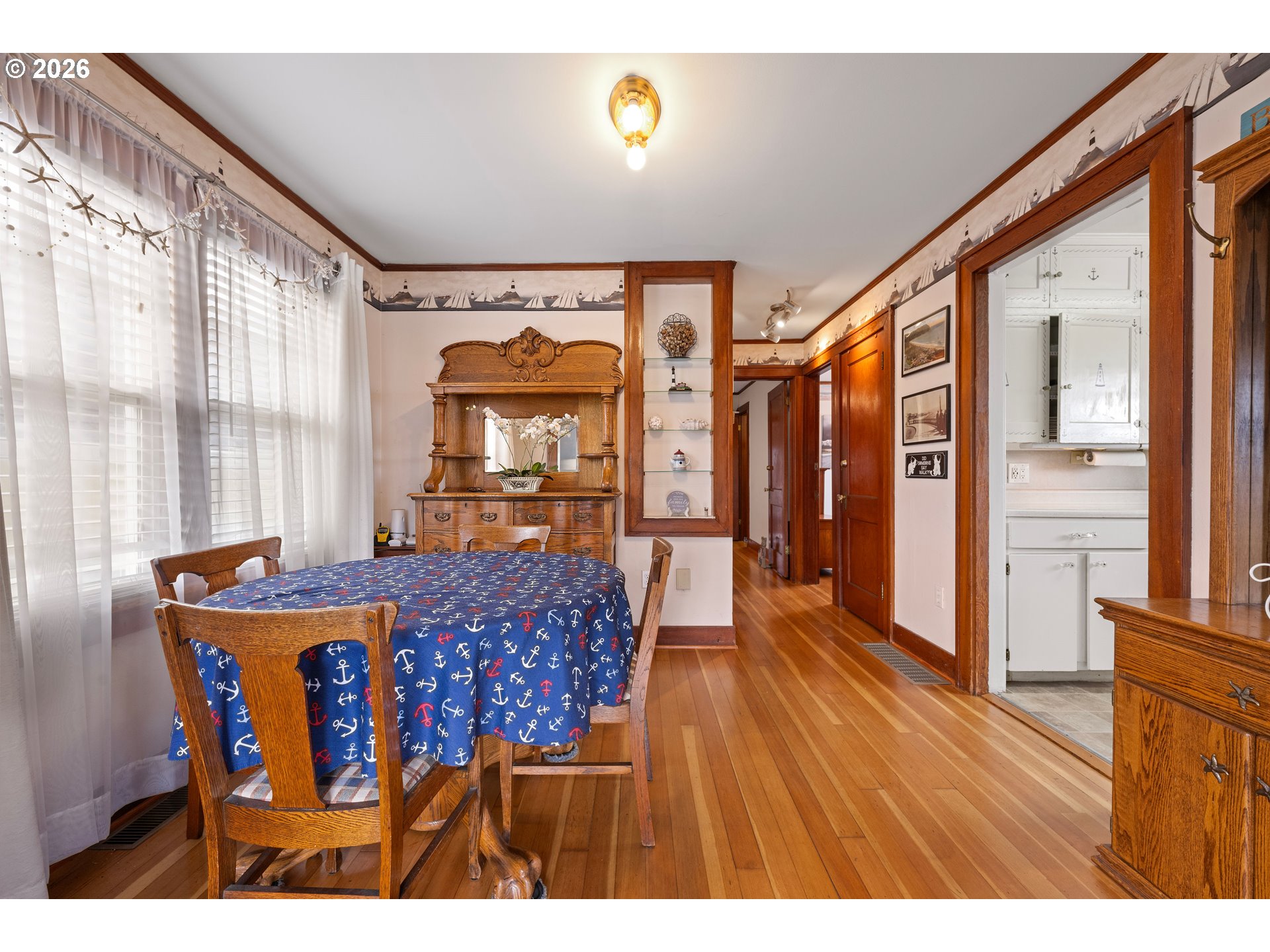 416 South Downing Street Seaside, OR 97138 - Photo 26 of 48 a dining room with furniture and window