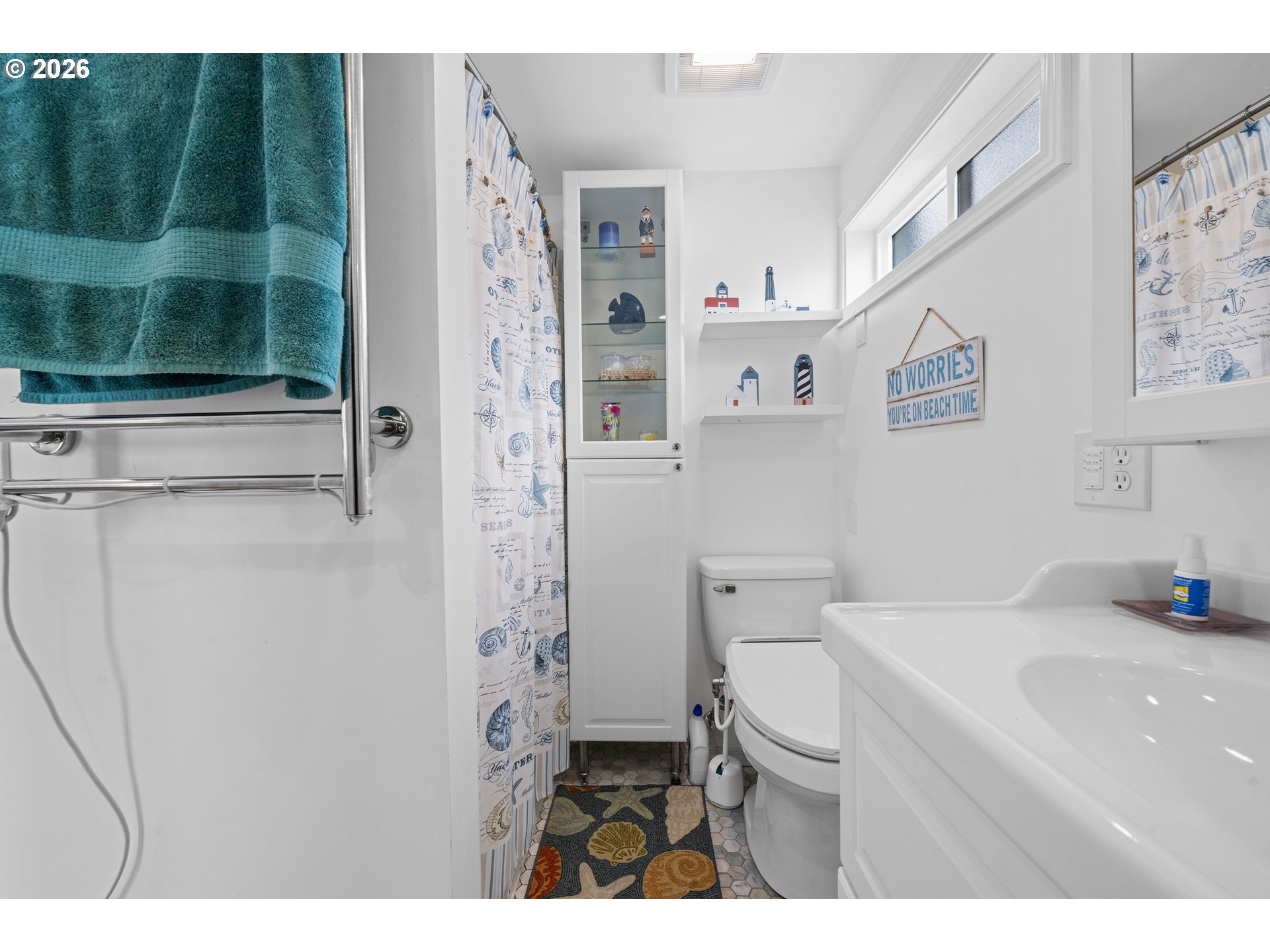 416 South Downing Street Seaside, OR 97138 - Photo 43 of 48 a bathroom with a sink toilet and shower