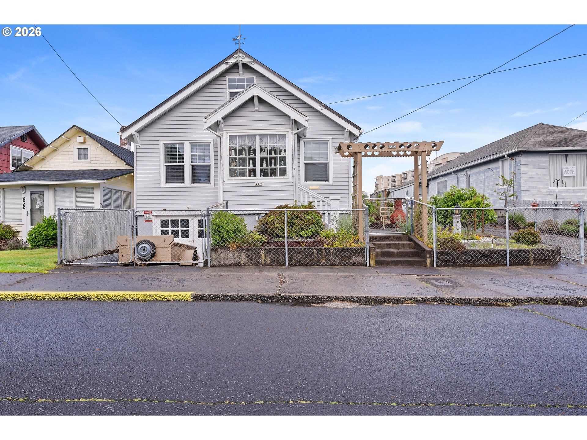 416 South Downing Street Seaside, OR 97138 - Photo 9 of 48 a view of a house with a yard and sitting area