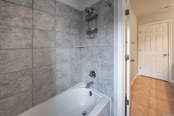 a bathroom with a bathtub