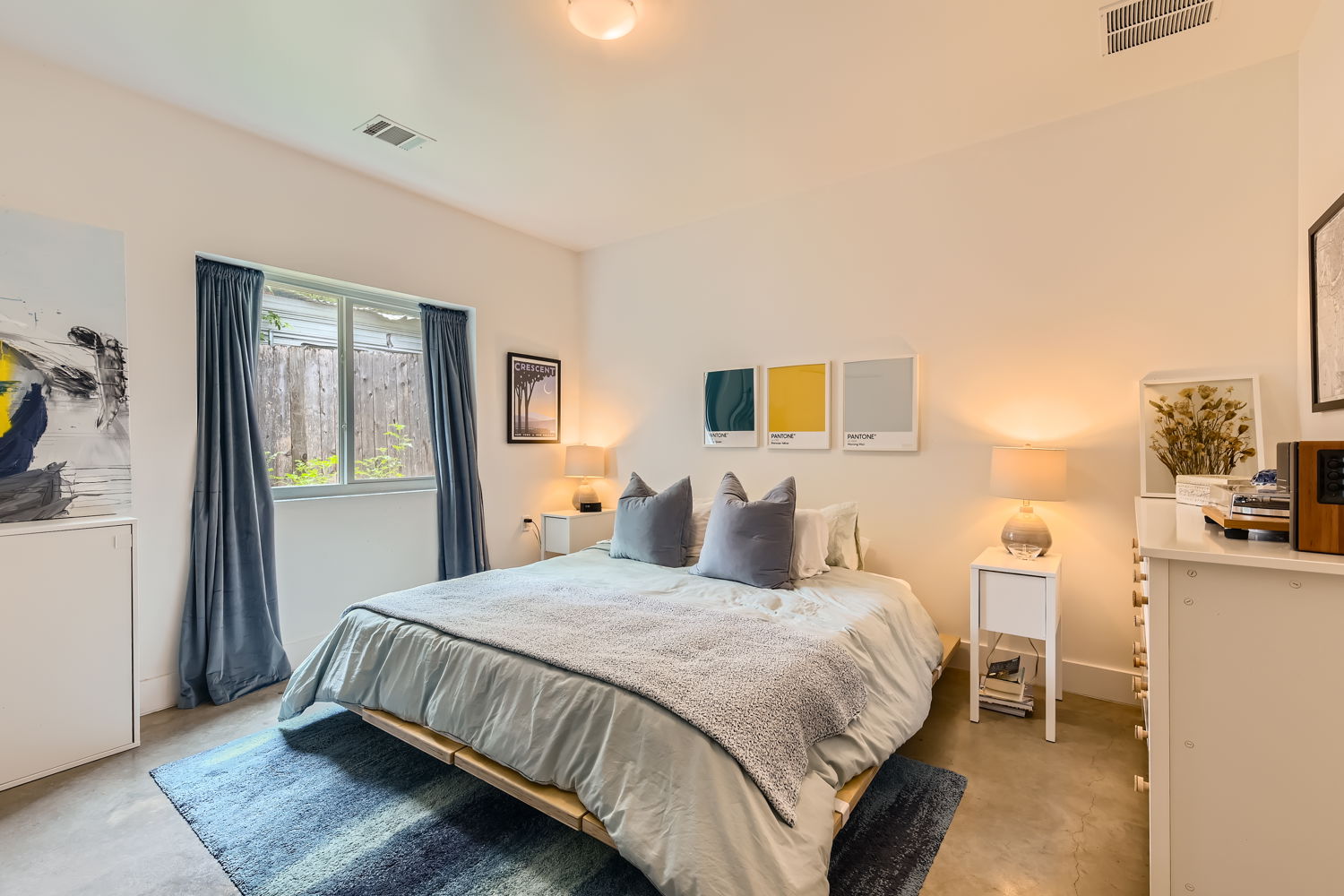 1908 East 21st Street, Unit 1 AND 2 Austin, TX 78722 - Photo 9 of 38 a bedroom with a bed wooden floor and a view of bedroom