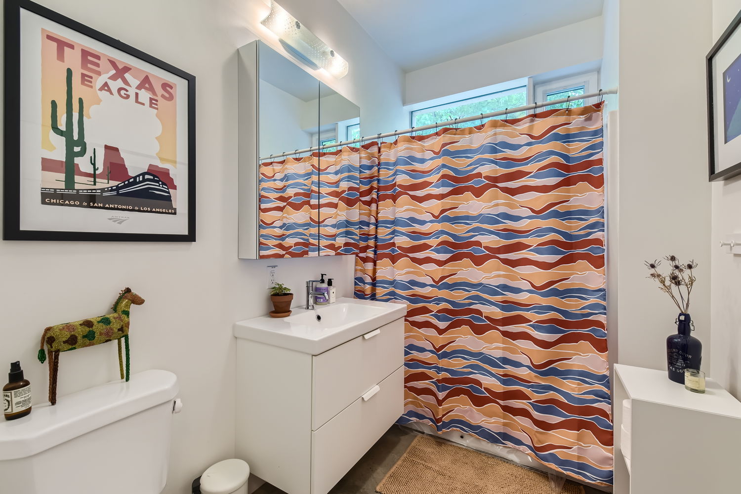 1908 East 21st Street, Unit 1 AND 2 Austin, TX 78722 - Photo 10 of 38 a bathroom with a sink and a mirror