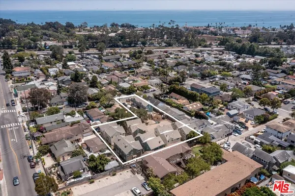an aerial view of a city with lots of residential buildings