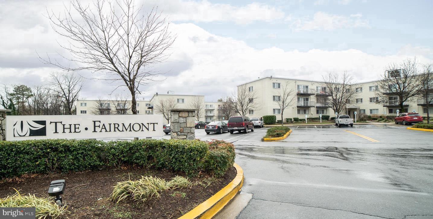 a view of city street with large buildings