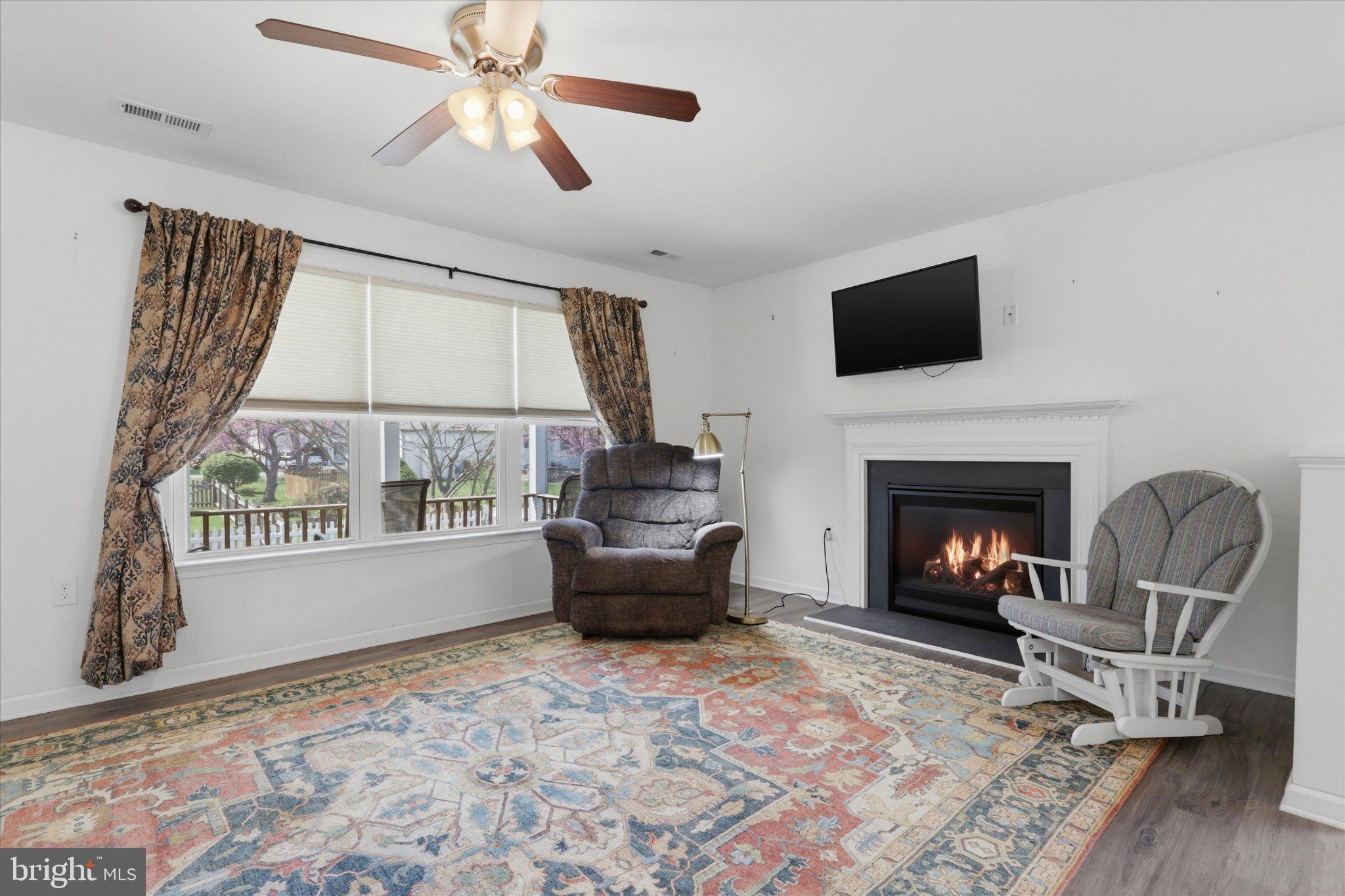 75 Saffron Terrace Falling Waters, WV 25419 - Photo 12 of 46 Cozy living space with warm ambiance.