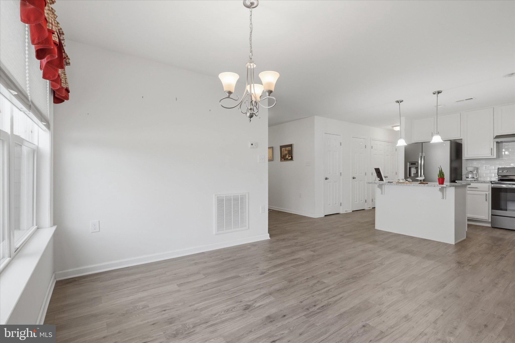 75 Saffron Terrace Falling Waters, WV 25419 - Photo 17 of 46 Bright and airy open living space.