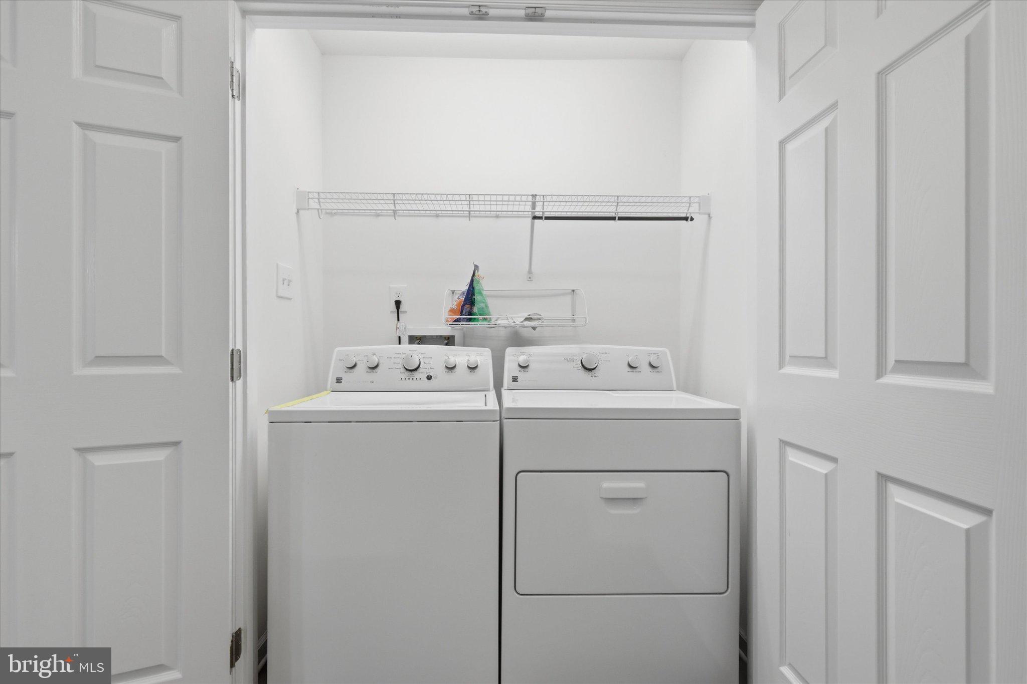 75 Saffron Terrace Falling Waters, WV 25419 - Photo 40 of 46 Efficient laundry space in bright setting.