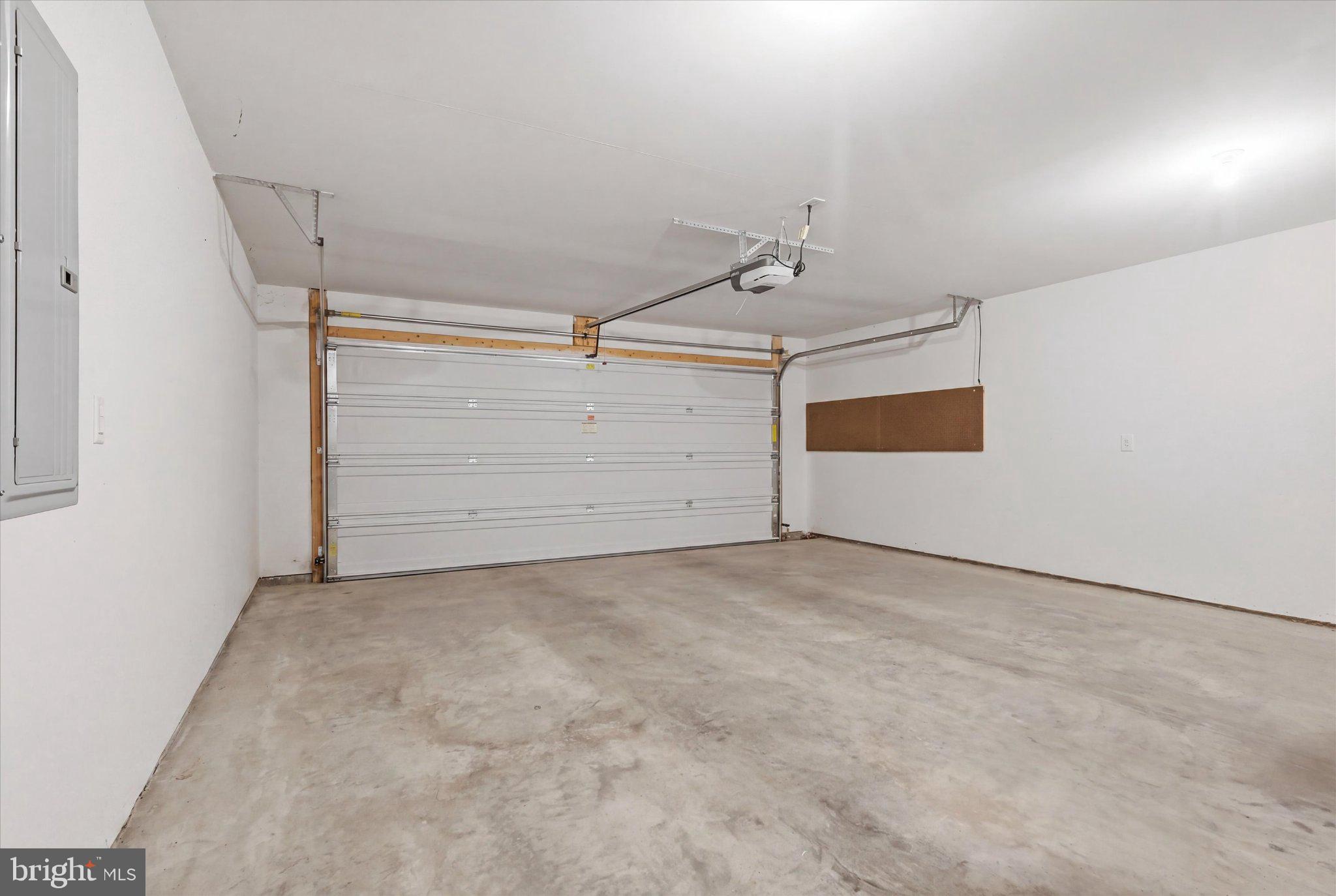 75 Saffron Terrace Falling Waters, WV 25419 - Photo 46 of 46 Spacious garage with ample potential.