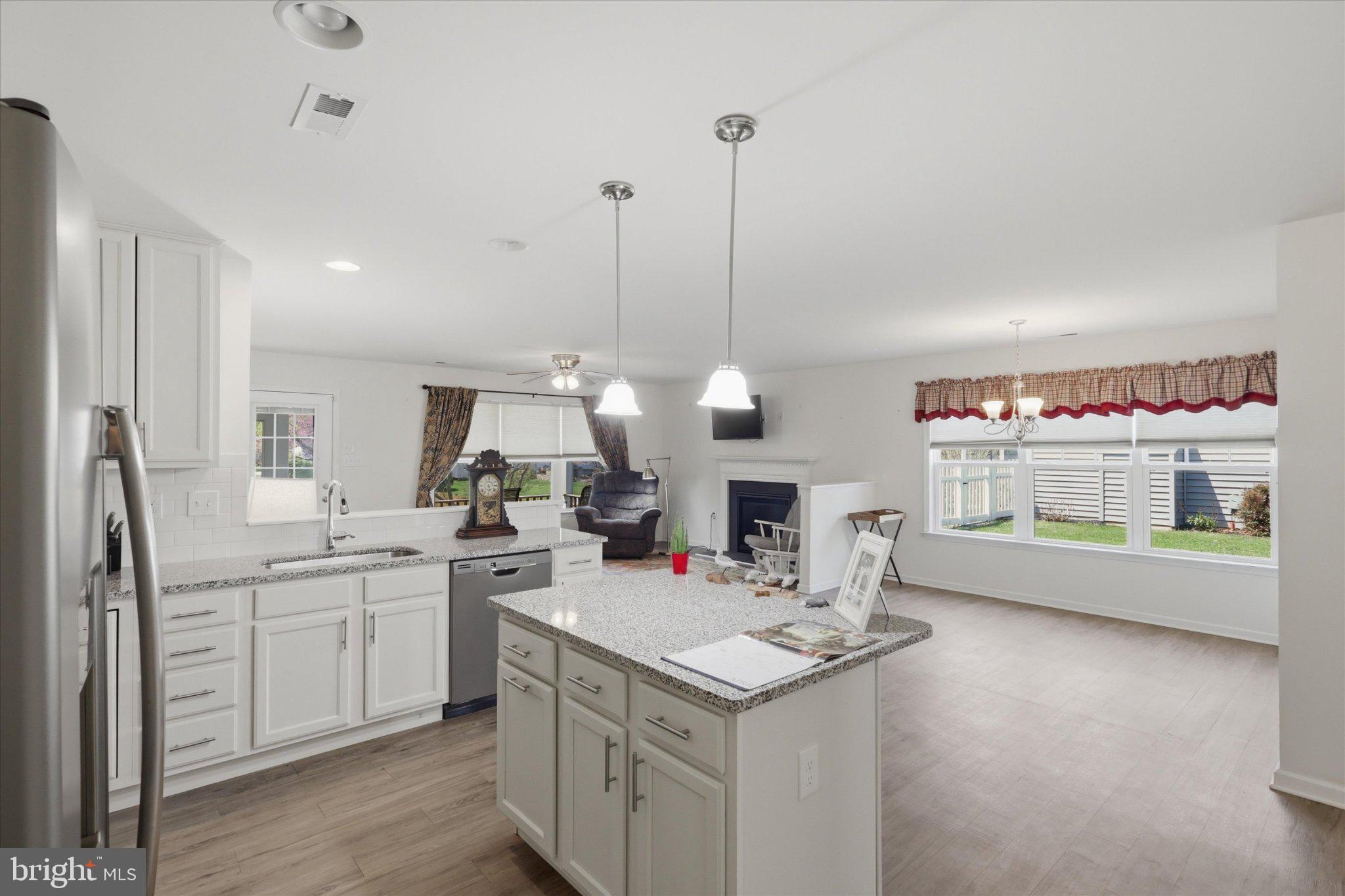 75 Saffron Terrace Falling Waters, WV 25419 - Photo 5 of 46 Bright and inviting open-concept space.