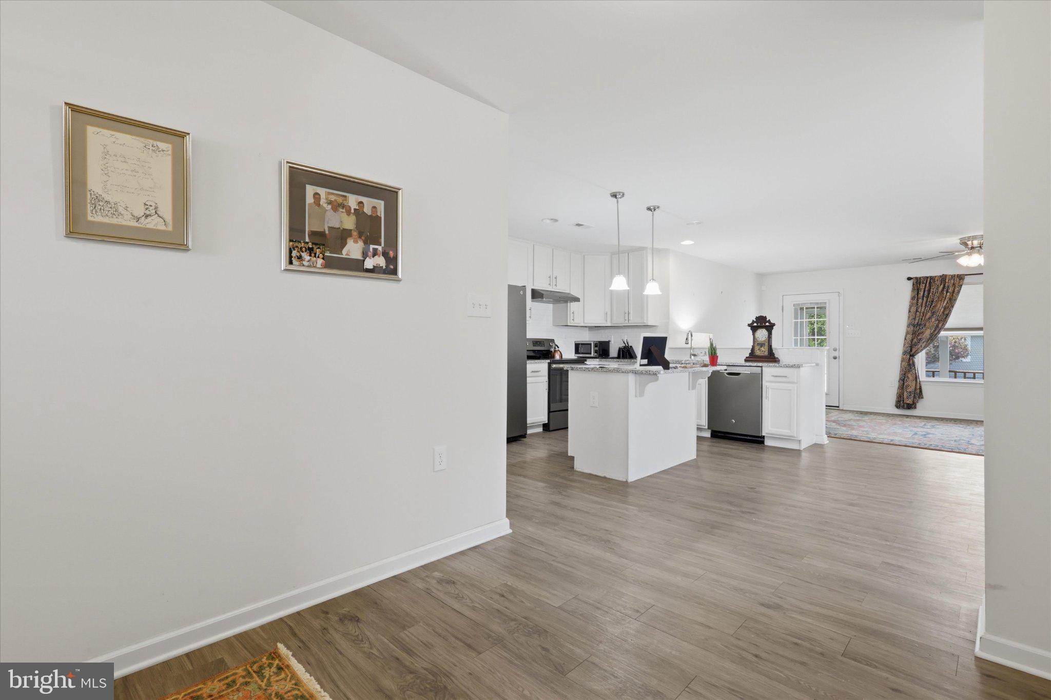 75 Saffron Terrace Falling Waters, WV 25419 - Photo 8 of 46 Modern open-concept living space.