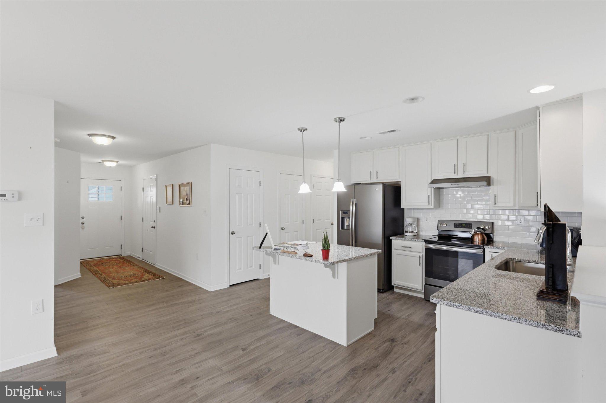 75 Saffron Terrace Falling Waters, WV 25419 - Photo 9 of 46 Modern kitchen with open layout charm.