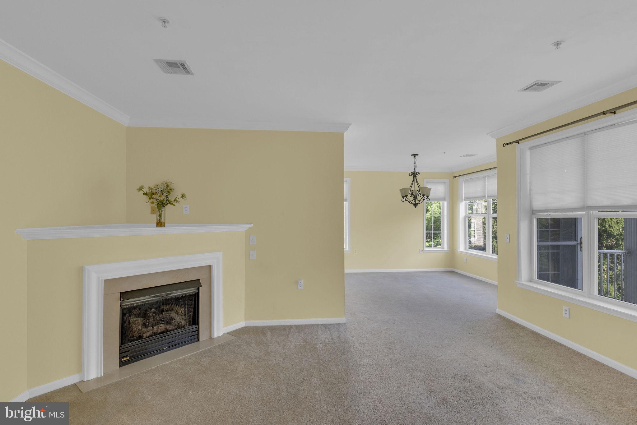 222 Masterson Court Ewing, NJ 08618 - Photo 11 of 43 a view of an empty room with a fireplace