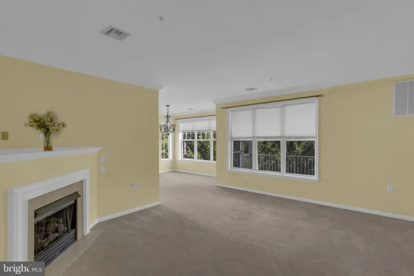 a view of a windows and chandelier in a room