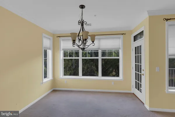 a view of a room with windows