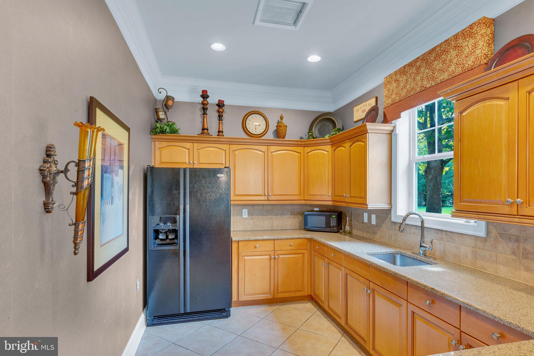 222 Masterson Court Ewing, NJ 08618 - Photo 39 of 43 a kitchen with stainless steel appliances granite countertop a refrigerator and a sink