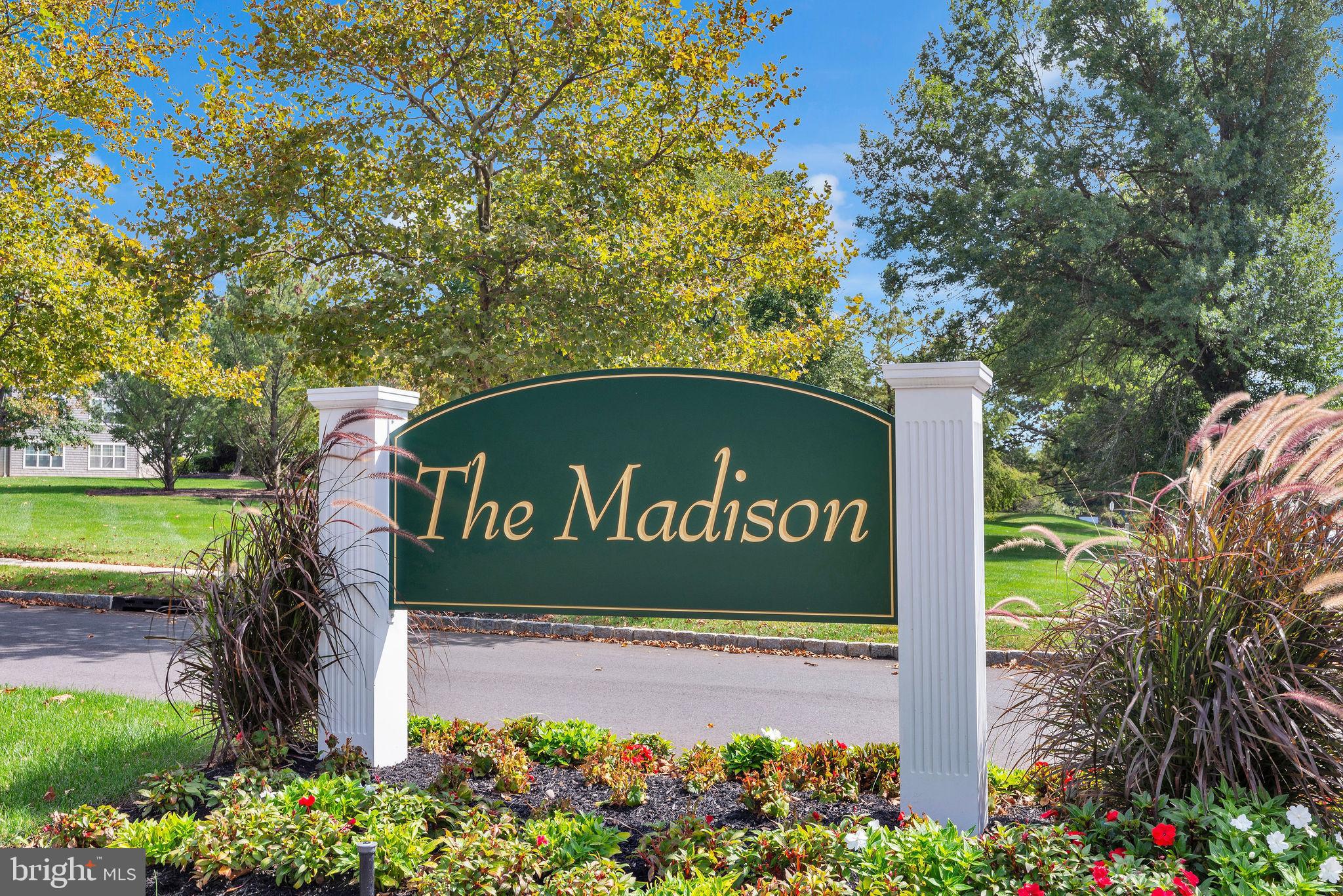222 Masterson Court Ewing, NJ 08618 - Photo 42 of 43 a sign broad in front of flowers