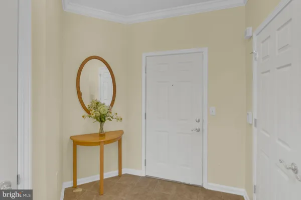 a view of a hallway to a closet