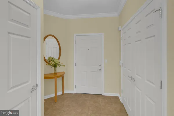 a view of an empty room with a fireplace