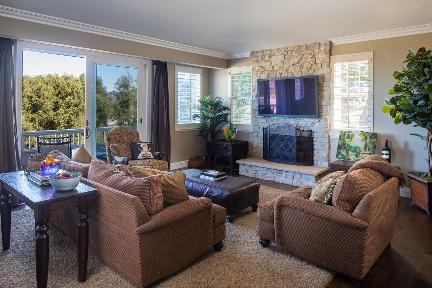 10448 Fairway Lane Carmel, CA 93923 - Photo 3 of 21 a living room with furniture fireplace and a large window