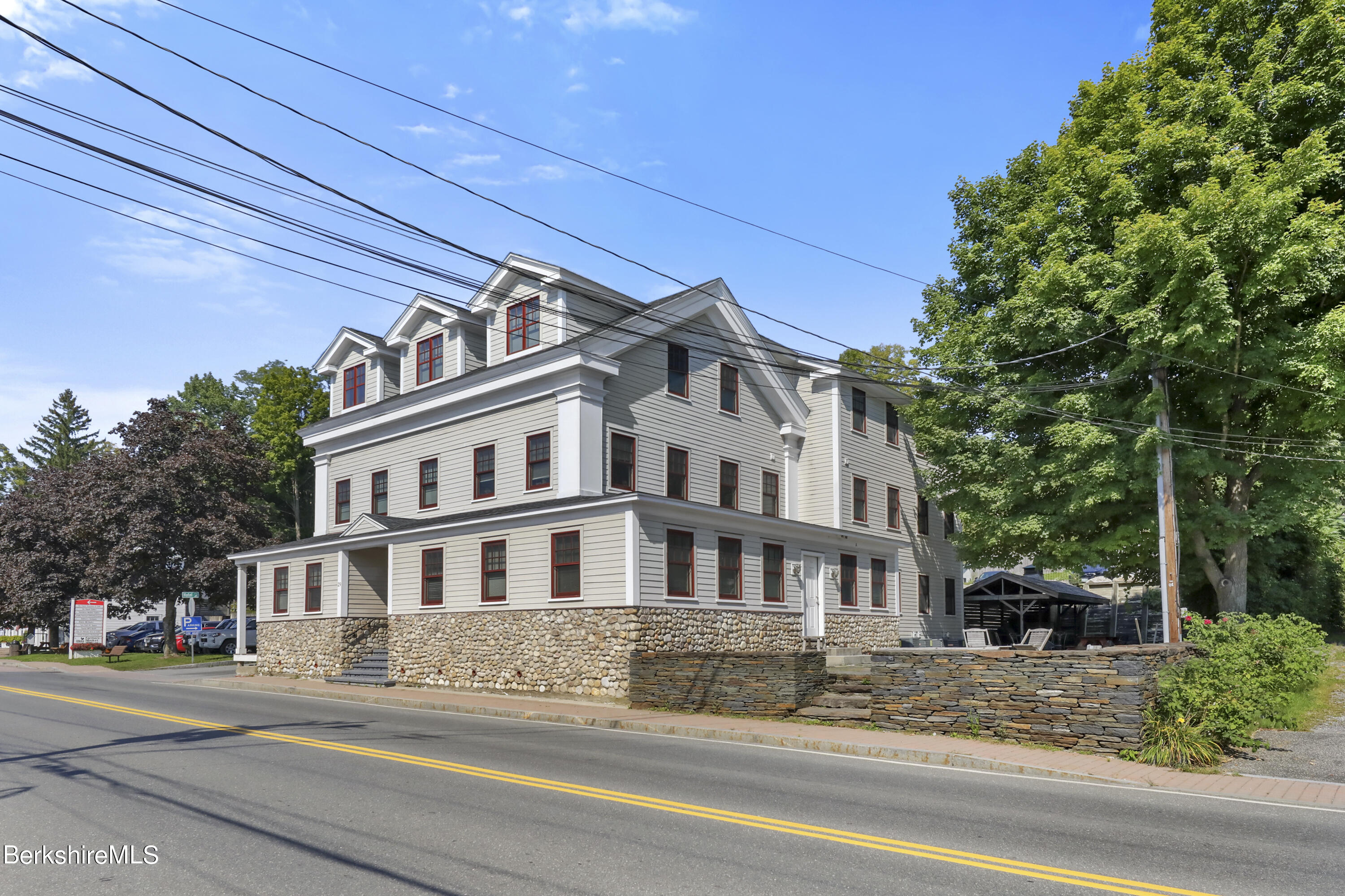 29 Main Street West Stockbridge, MA 01266 - Photo 46 of 51 a front view of a house with a garden
