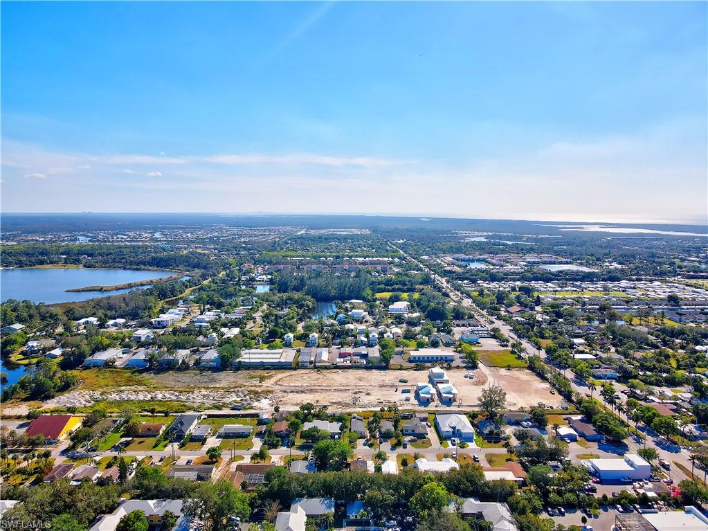 3054 Coco Avenue Naples, FL 34112 - Photo 4 of 13 an aerial view of a city with lots of residential buildings