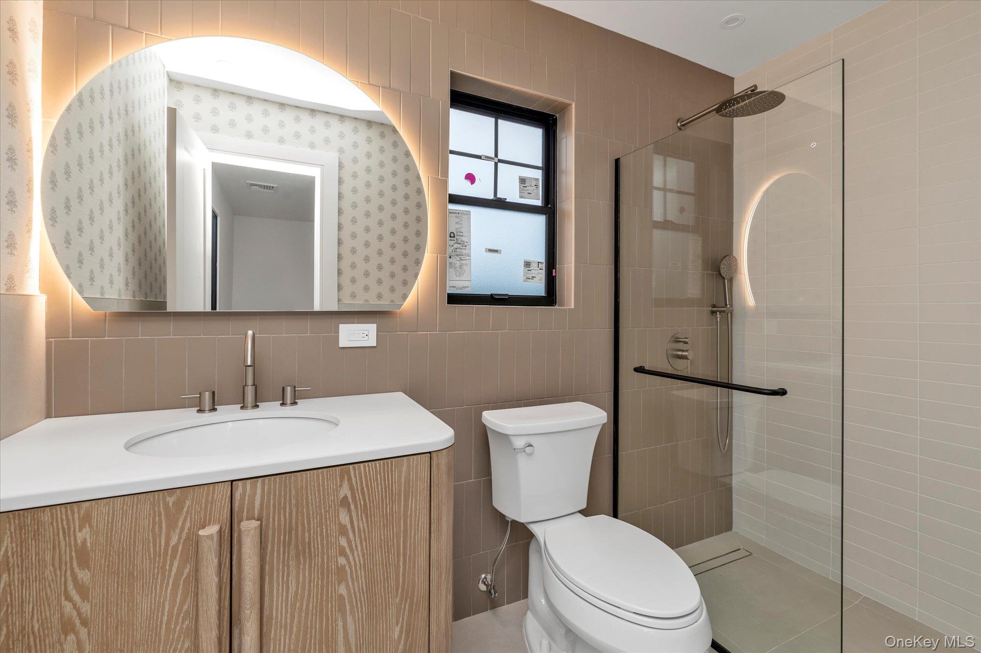 1497 Carroll Street Wantagh, NY 11793 - Photo 13 of 18 Full bath with tile walls, vanity, a walk in shower, and tasteful backsplash