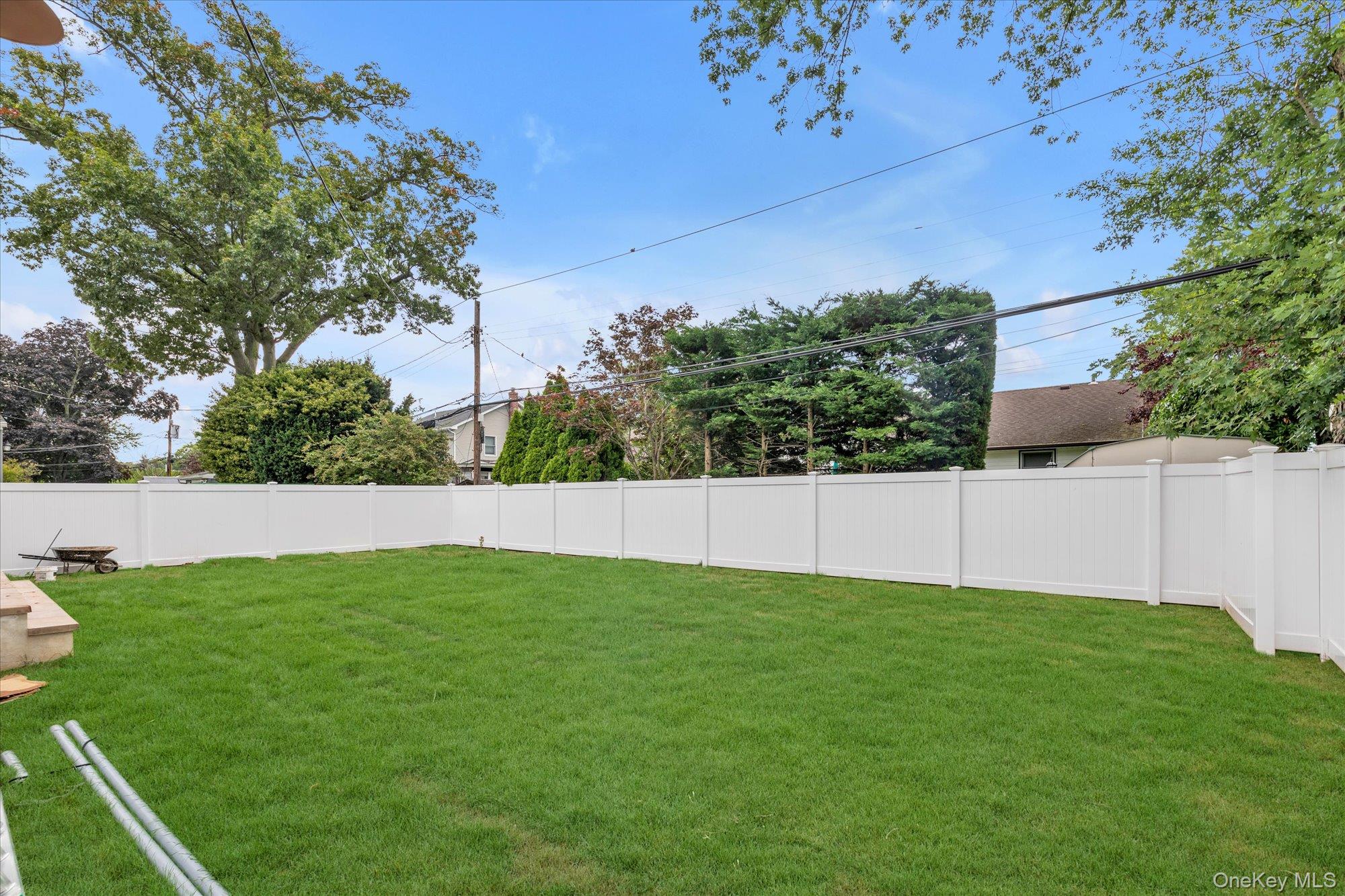 1497 Carroll Street Wantagh, NY 11793 - Photo 17 of 18 View of fenced backyard