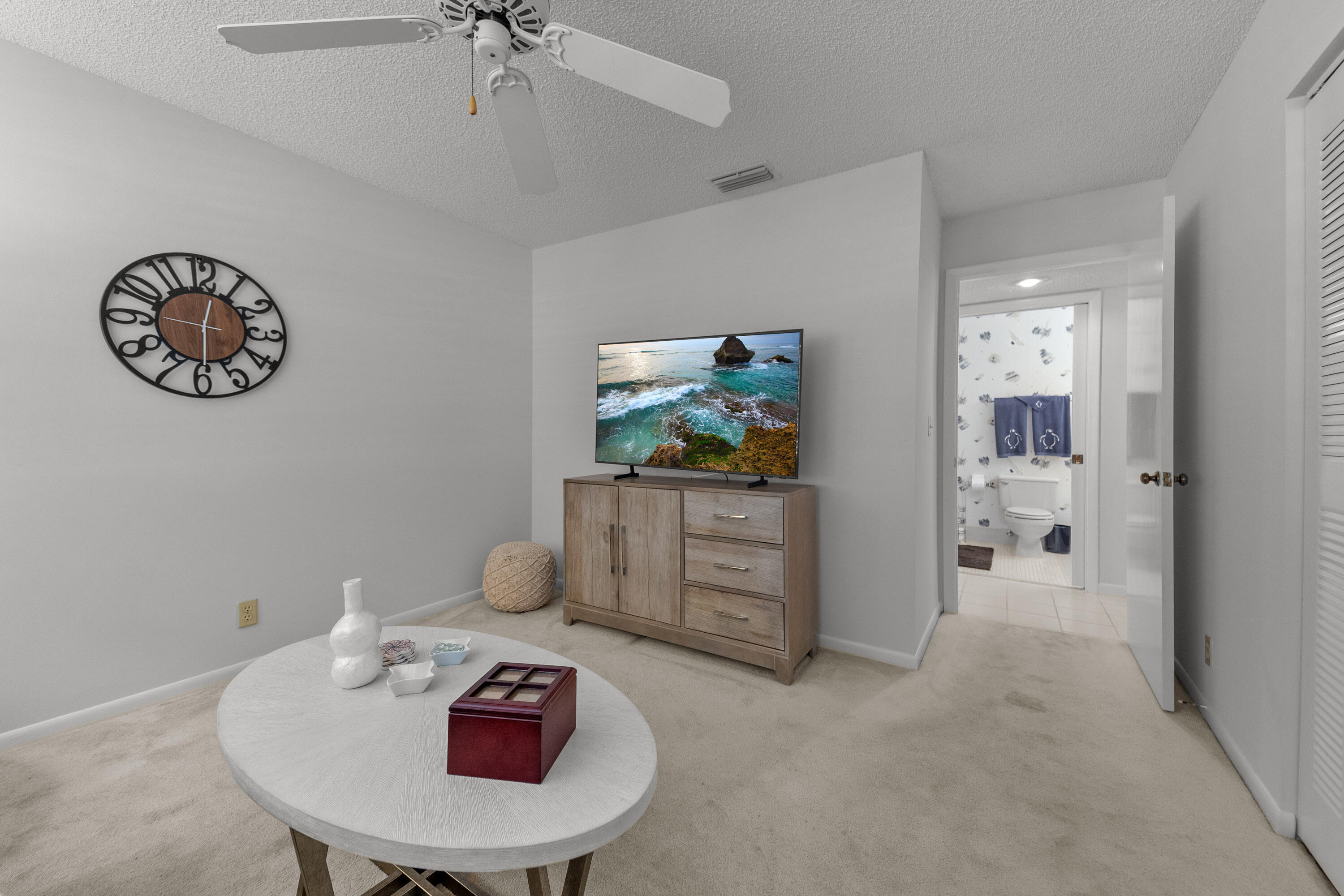 5080 Nesting Way, Unit A Delray Beach, FL 33484 - Photo 14 of 37 a living room with furniture and a table