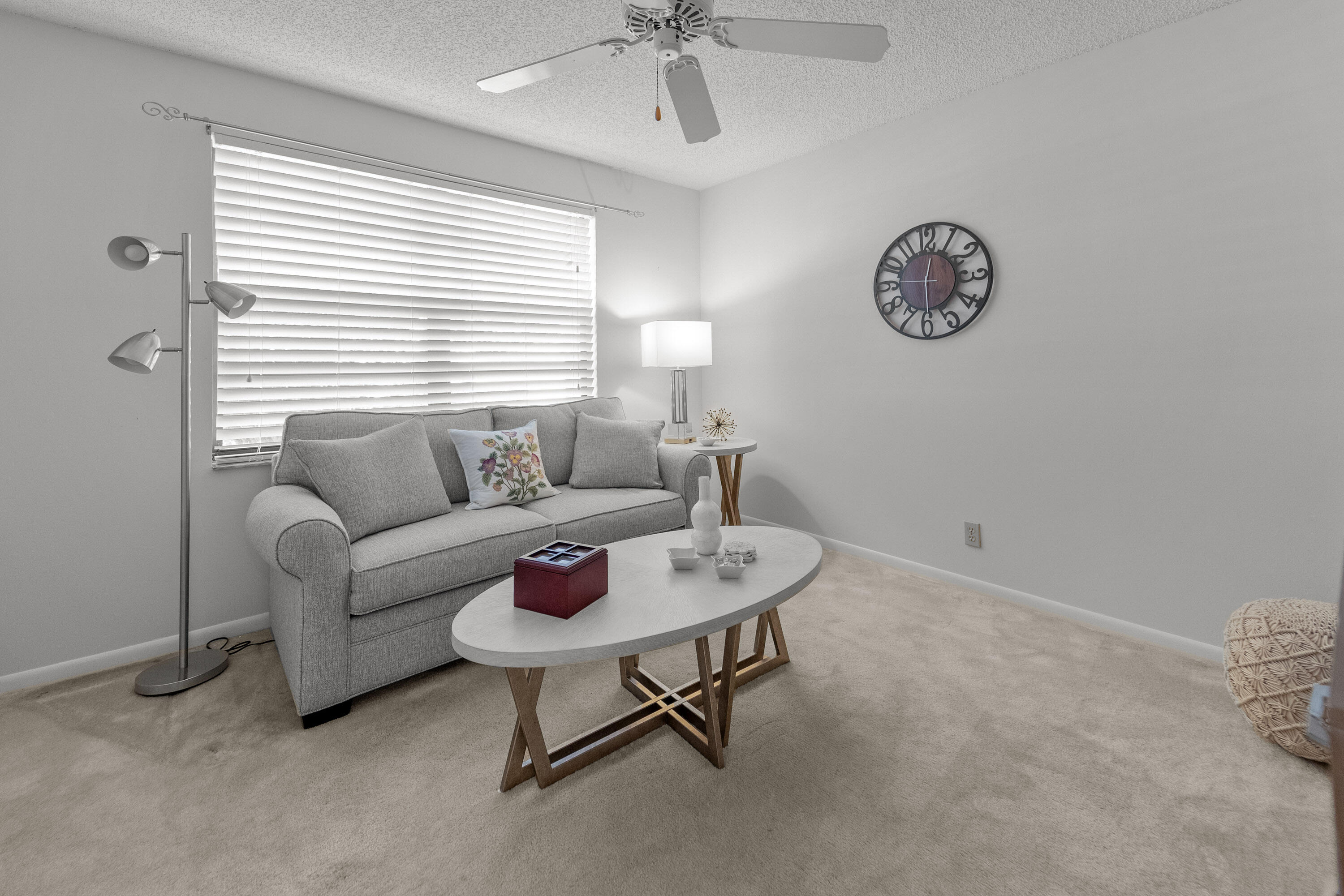 5080 Nesting Way, Unit A Delray Beach, FL 33484 - Photo 17 of 37 a living room with furniture and a window