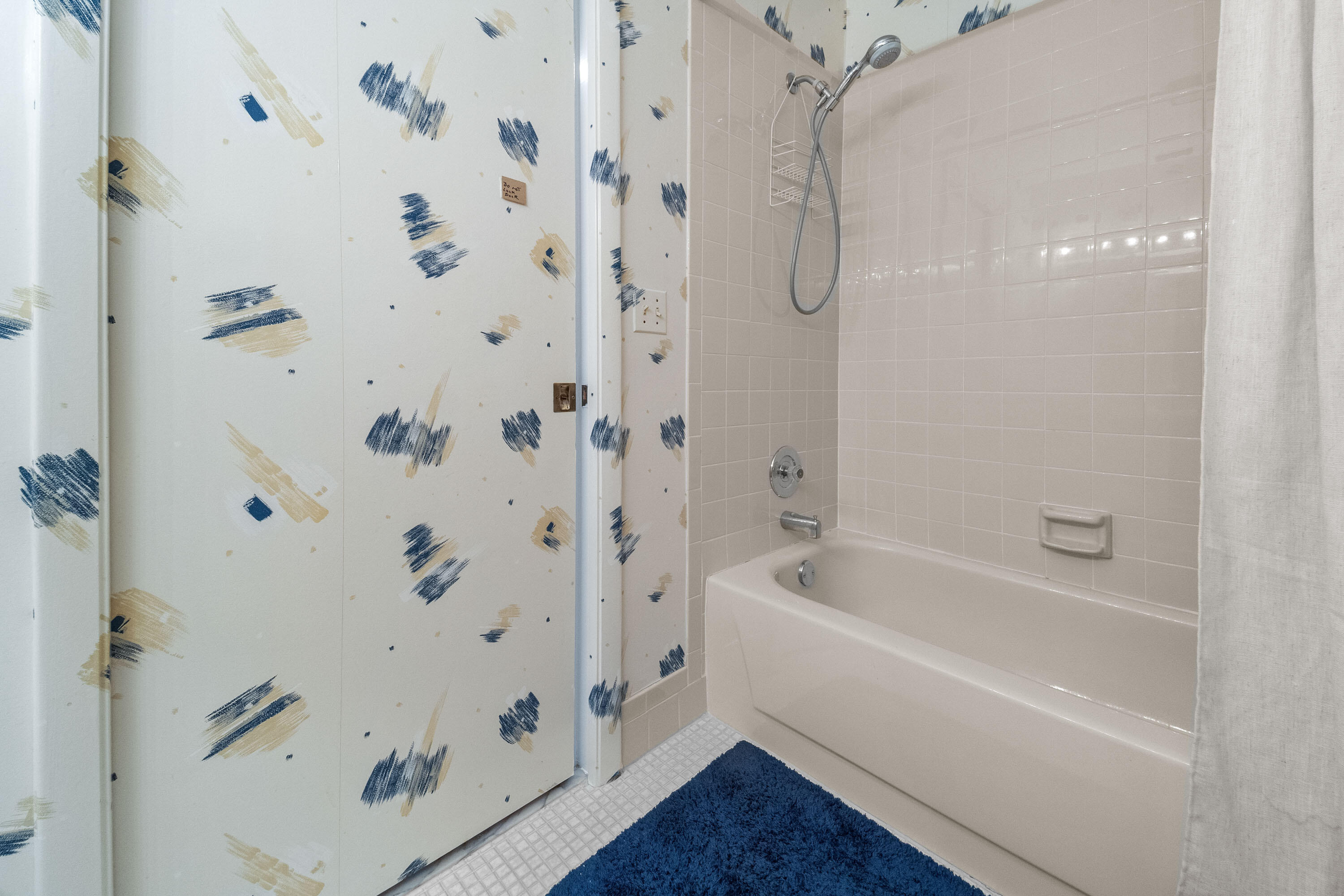 5080 Nesting Way, Unit A Delray Beach, FL 33484 - Photo 18 of 37 a bathroom with a bathtub and a shower