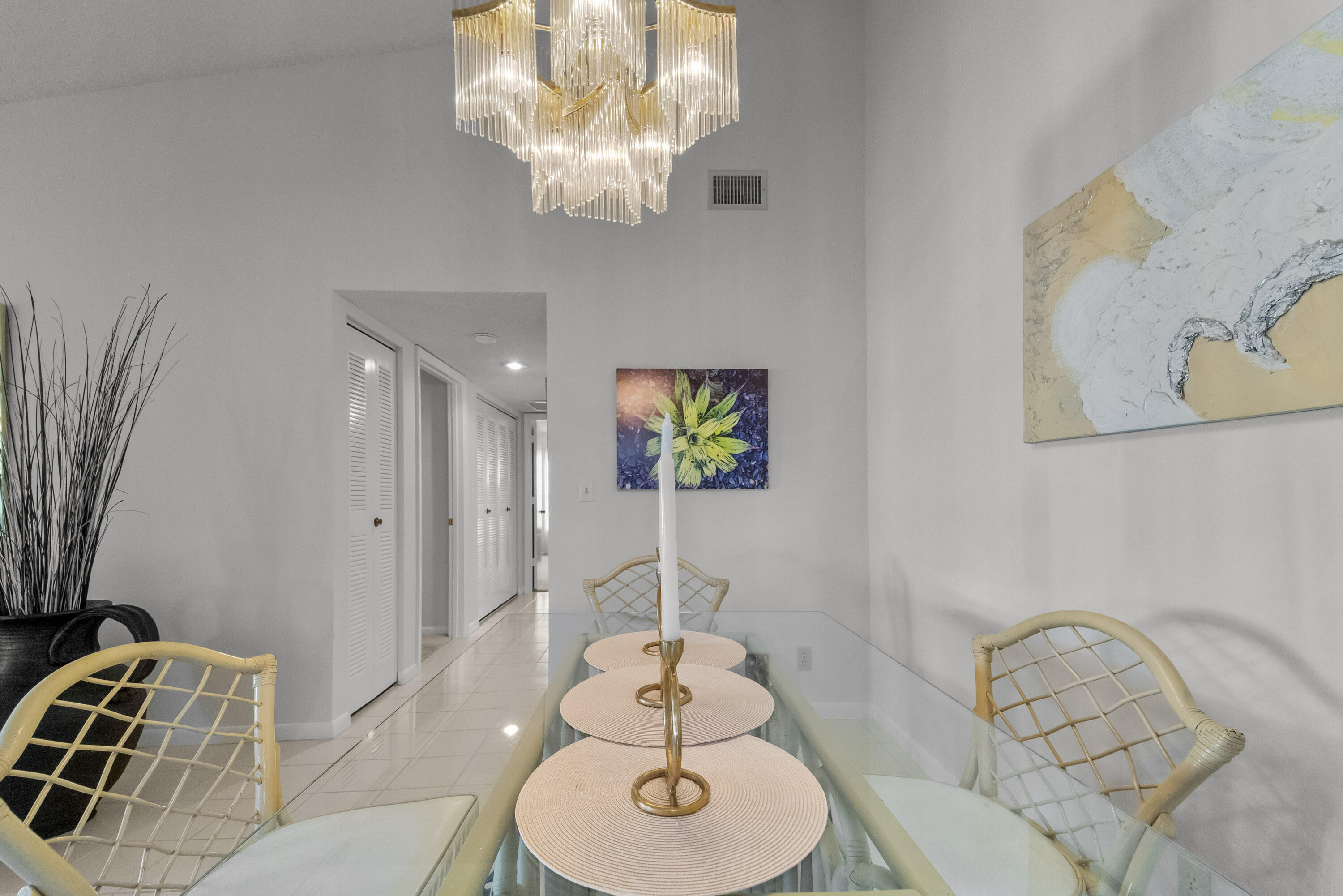 5080 Nesting Way, Unit A Delray Beach, FL 33484 - Photo 20 of 37 a bathroom with a sink and a mirror