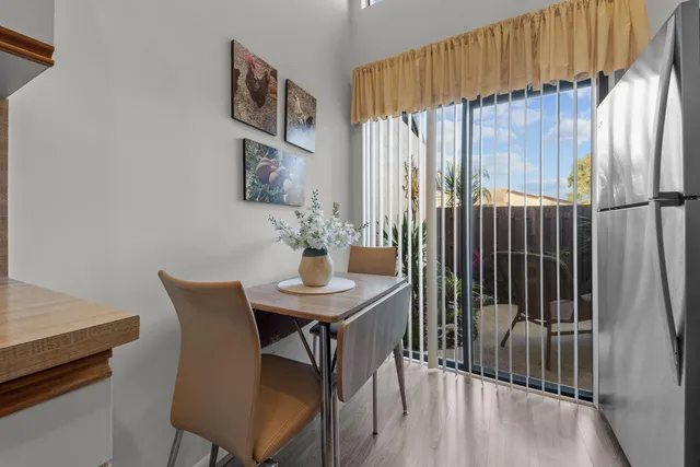 a kitchen with a sink and a microwave
