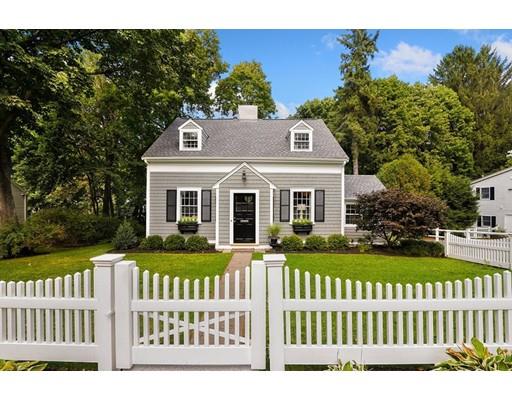 12 Cleveland Road Wellesley, MA 02481 - Photo 1 of 25 a front view of a house with a garden
